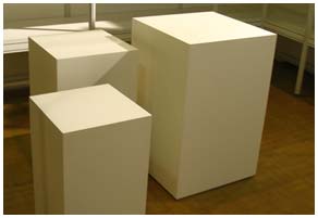 Three plinths ready to be installed into an exhibition stand.